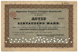 Altes deutsches Aktienzertifikat, ausgestellt von der deutschen Regierung, mit gedrucktem Text und einem offiziellen Stempel.