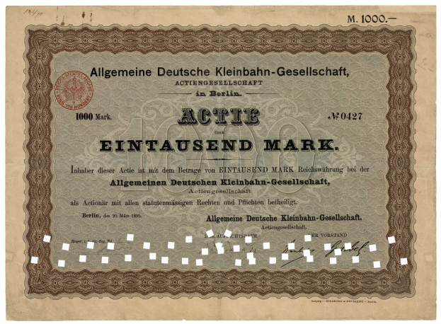 Altes deutsches Aktienzertifikat, ausgestellt von der deutschen Regierung, mit gedrucktem Text und einem offiziellen Stempel.