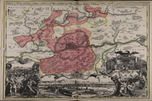 Ein altes Buch mit einer zentralen Deutschlandkarte, umgeben von Illustrationen und Text, verströmt einen klassischen und zeitlosen Look.