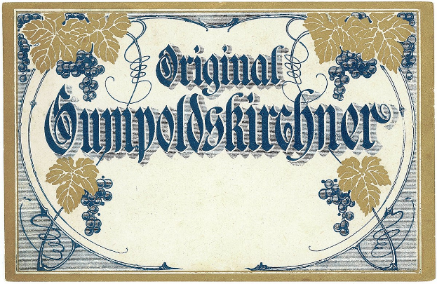 Ein altes deutsches Wein-Etikett mit einer Illustration von Trauben und Blättern und einem Text, der den Weintyp angibt.