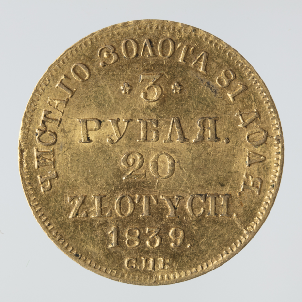 Eine Goldmünze mit der Aufschrift "20 zlotych 1839" auf einem weißen Hintergrund.