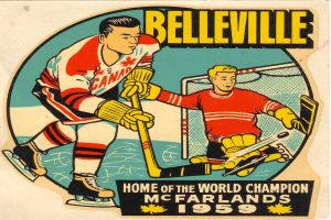 Plakat mit zwei Hockey-Spielern in Uniform mit Stöcken, darüber der Text 'Belleville Home of the World Champion'