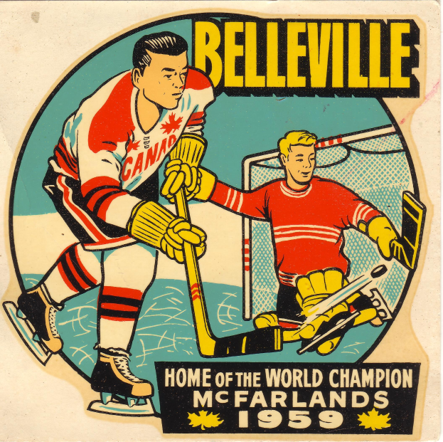 Plakat mit zwei Hockey-Spielern in Uniform mit Stöcken, darüber der Text 'Belleville Home of the World Champion'